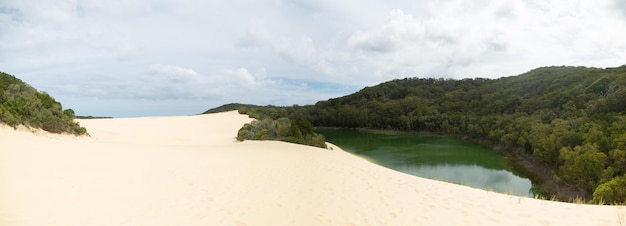 Panoramic View of Sand Dune and Lake Against SkyWabby Lake in Fraser IslandQueenslandAustralia