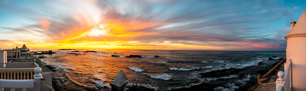 Photo panoramic view of sea against sky during sunset