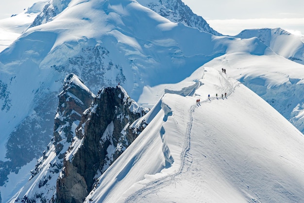 Panoramic view of snowcapped mountains against sky