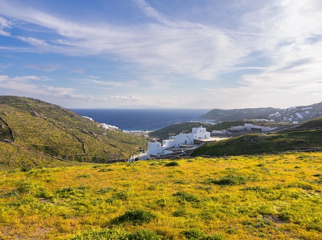 Panoramic view of the snowwhite villas and the sea on the island of Mykonos in Greece