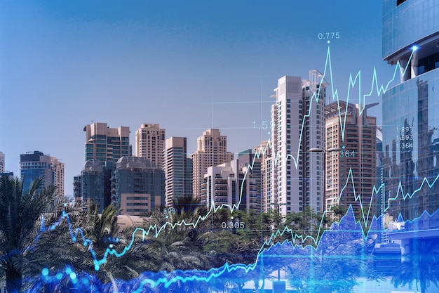 Panoramic view of steel and glass skyscrapers of Dubai Marina Modern cityscape of the capital of the UAE Financial services hub FOREX graph and chart concept Double exposure