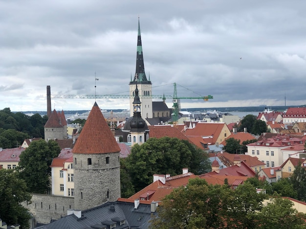 Panoramic view of Tallinn old town with cathedrals and red roofs, Estonia, summer 202