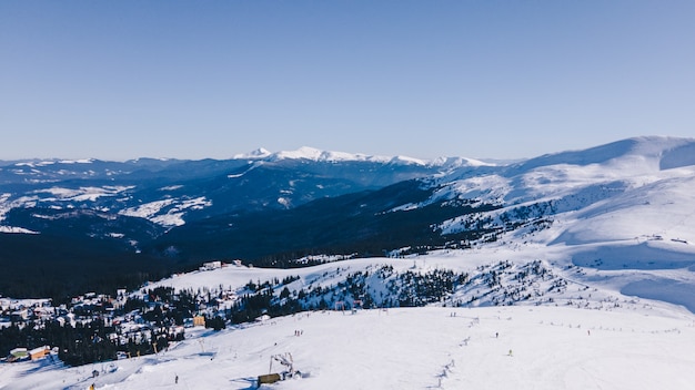 Panoramic view of winter snowed mountains beauty in nature. copy space