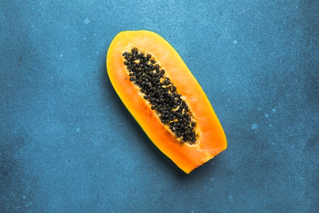 Papaya fruits on concrete background