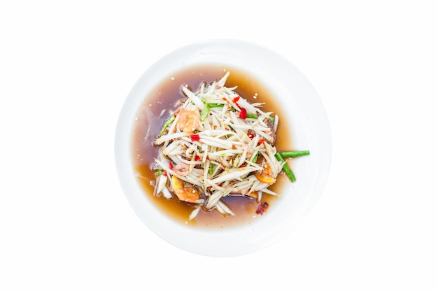 Papaya salad on white dish isolated on white background thai food style