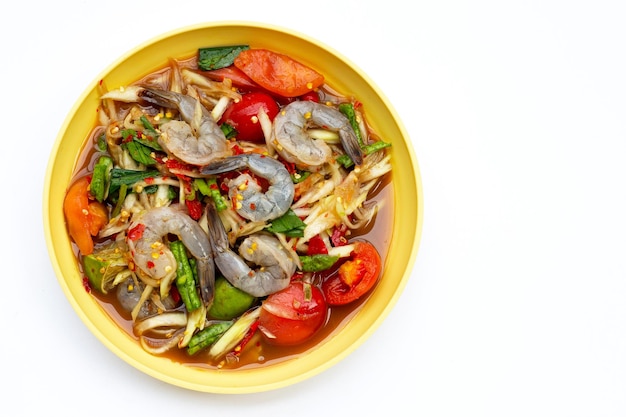 Papaya salad with shrimp in white plate