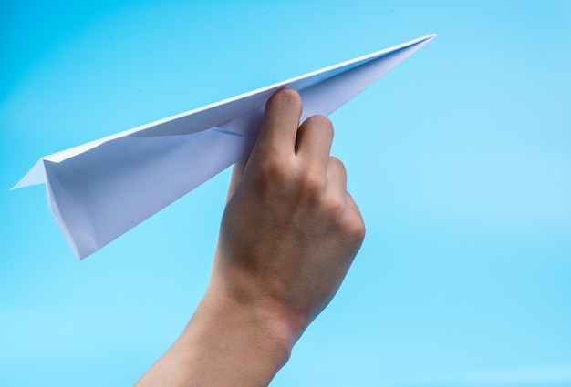 Paper airplane and blue sky.