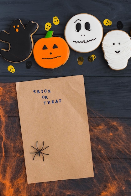 Photo a paper bag with halloween decorations on it and a paper bag that says halloween spooky