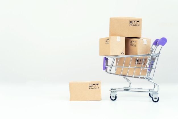 Paper boxes in a trolley with credit card