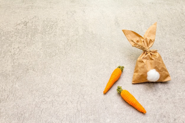 Paper bunny and knitted carrots for Easter