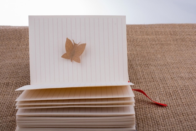 Paper cut out in shape of a butterfly