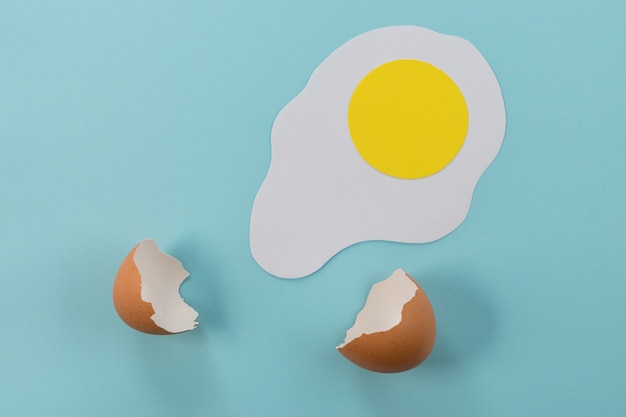 Paper fried egg  with broken egg shell.