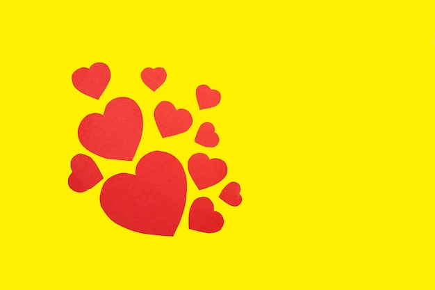 Paper hearts on yellow