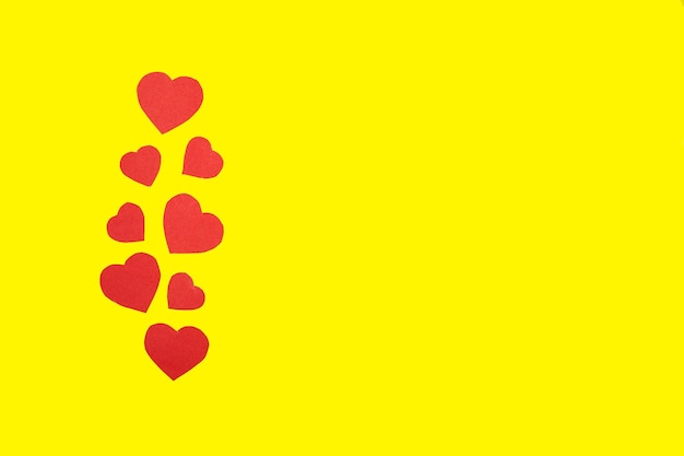 Paper hearts on yellow