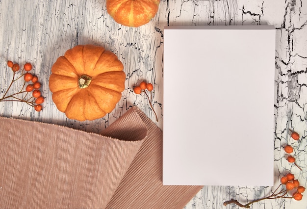 Paper mockup for your artwork or text with Autumn decorations