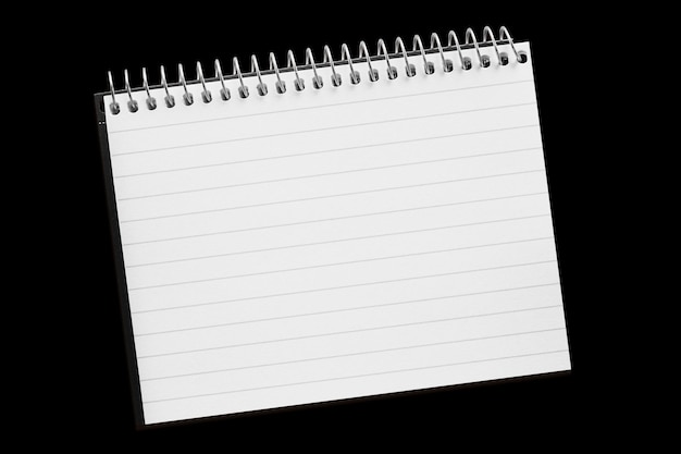 A paper page notebook isolated on the black background