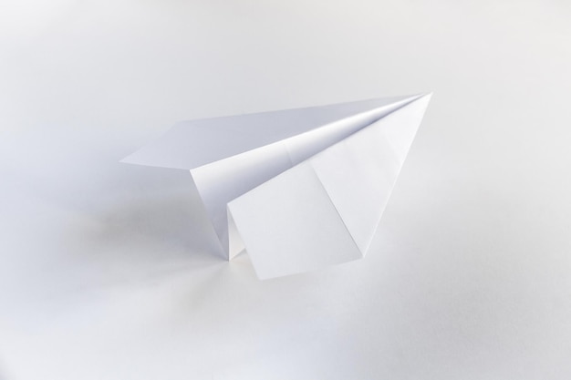 Paper plane origami isolated on a white background