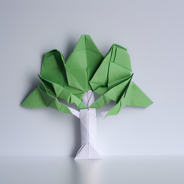 A paper tree with green leaves and white paper on the bottom.