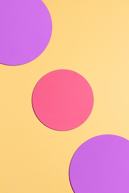 Paper yellow background with pink and purple circles