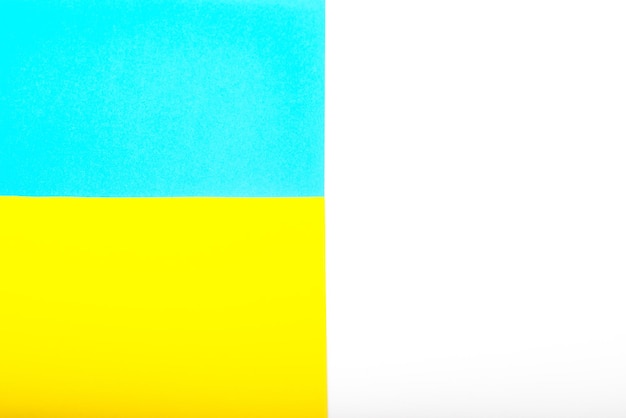 Paper yellow and blue colours as the symble flags of Ukraine Background for protest against war military conflict