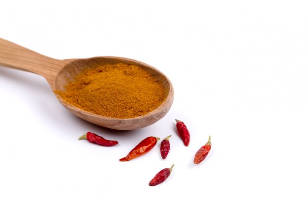 Paprika spice in wooden spoon. Picture of a Paprika spice in wooden spoon