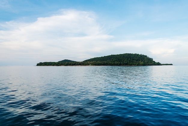 Paradise island with blue sky background