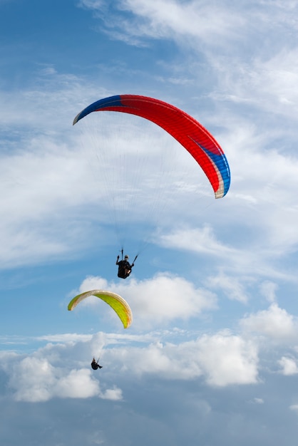 paragliding on the blue sky