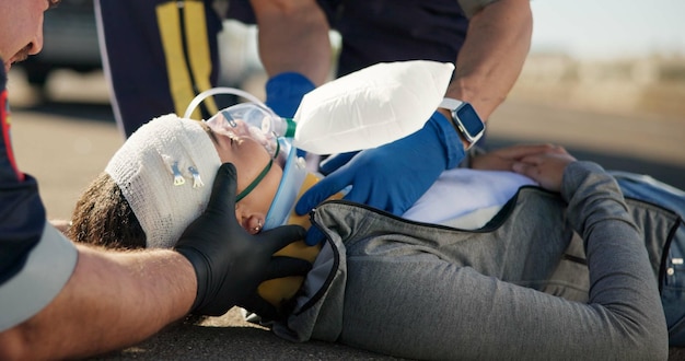 Photo paramedic emergency and injury check on road from car crash accident with healthcare emt men and first aid patient support ambulance staff and medical exam for concussion with rescue on stretcher