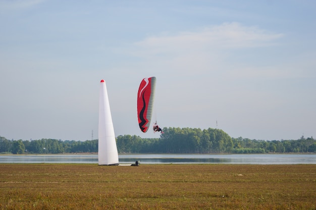 paramotor flying above water