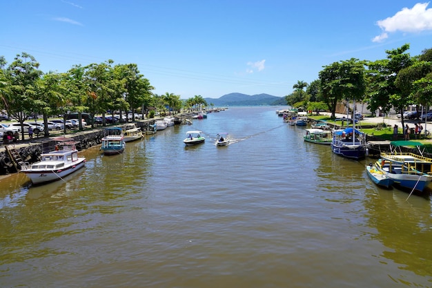 PARATY BRAZIL DECEMBER 25 2022 boats crosses the river in Paraty Brazil