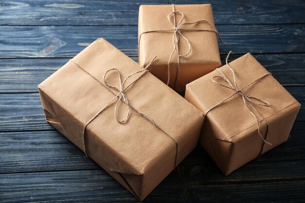 Parcel gift boxes on wooden background