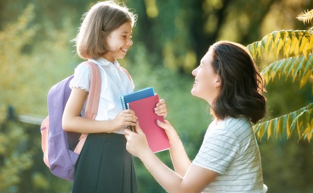 Parent and pupil go to school