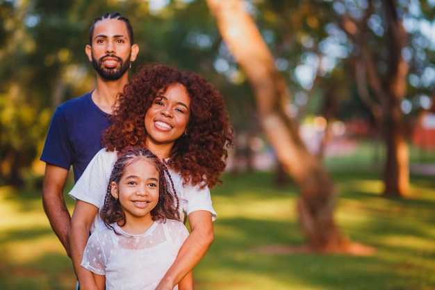 Parents and daughter in the park