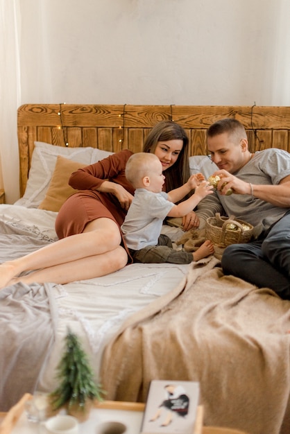 Parents playing with son