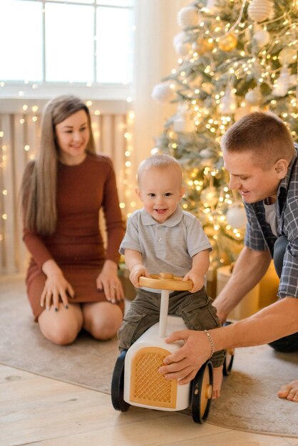 Parents playing with their child