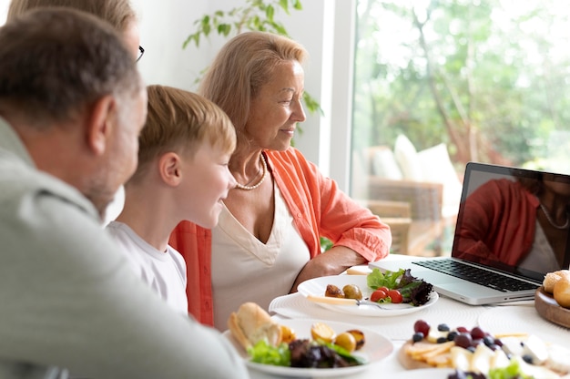 Parents spending time with their daughter and grandson