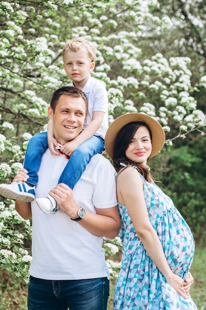 Parents and their little son in the park