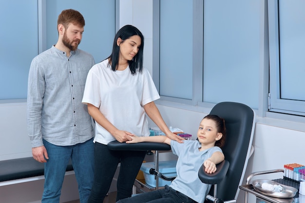 Parents with a child at a doctor's appointment