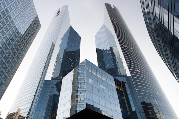 Paris, France - September 29, 2017: modern architecture of La Defense. Tall towers. Architectural design. Architecture and structure. Architecture and engineering. Architecture and urban development.