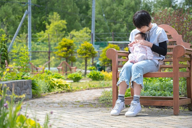 Park bench and parent and child