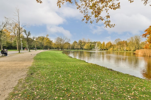 A park with a lake and a park bench