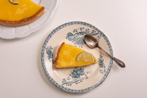 Part of lemon pie in an old plate