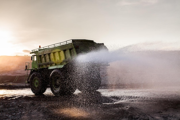 Part of a pit with big mining truck working