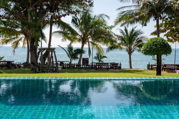 Part of swimming pool with background of tropical sea