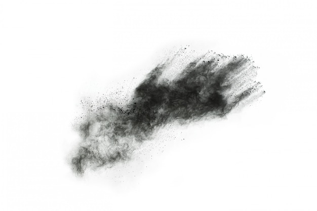 Particles of charcoal on white background, abstract powder splatter on white background