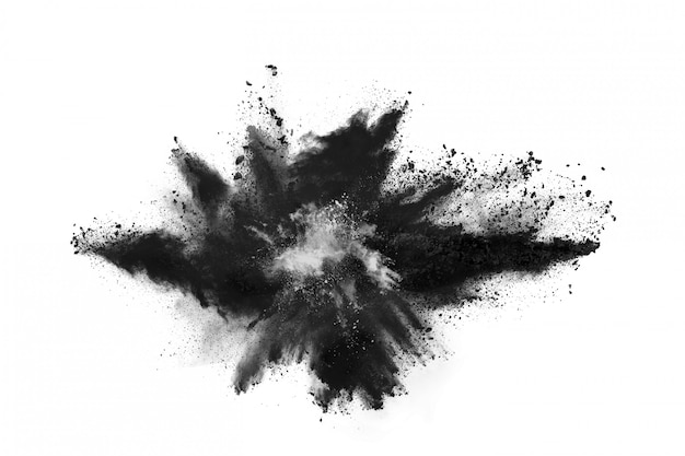 Particles of charcoal on white background