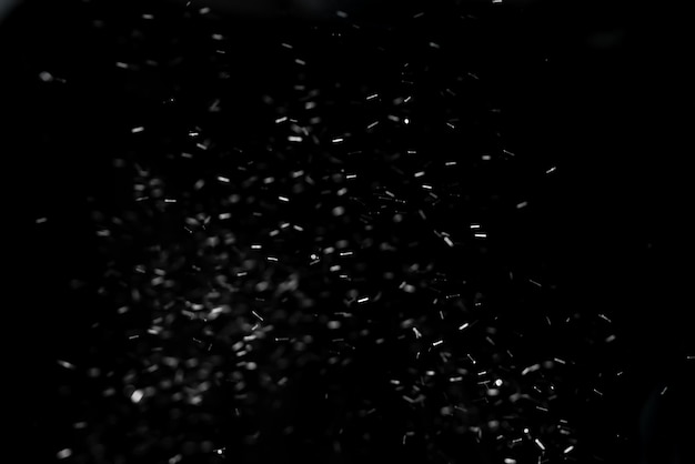 Party colorful glitter confetti on black background