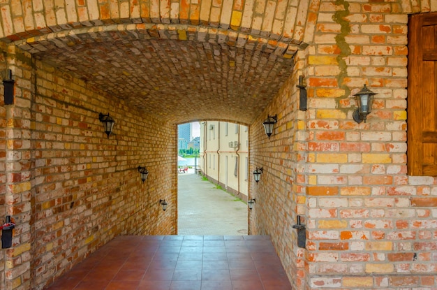 The passage under the brick house.