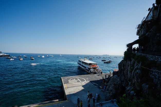 Passenger liner boats and yachts at Positano on Italy's Amalfi Coast