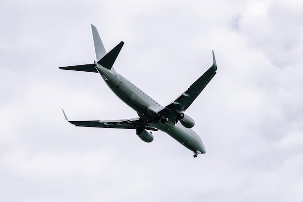 Passenger plane comes in for landing in cloudy weather